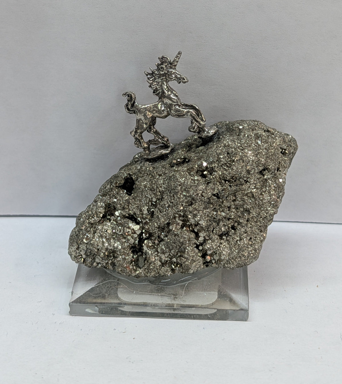 Unicorn on pyrite base