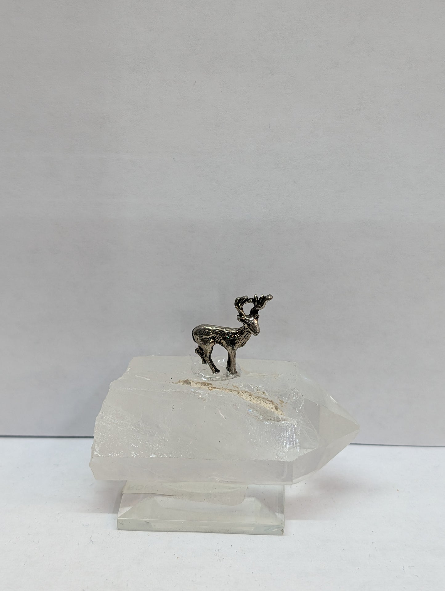 Deer on quartz base