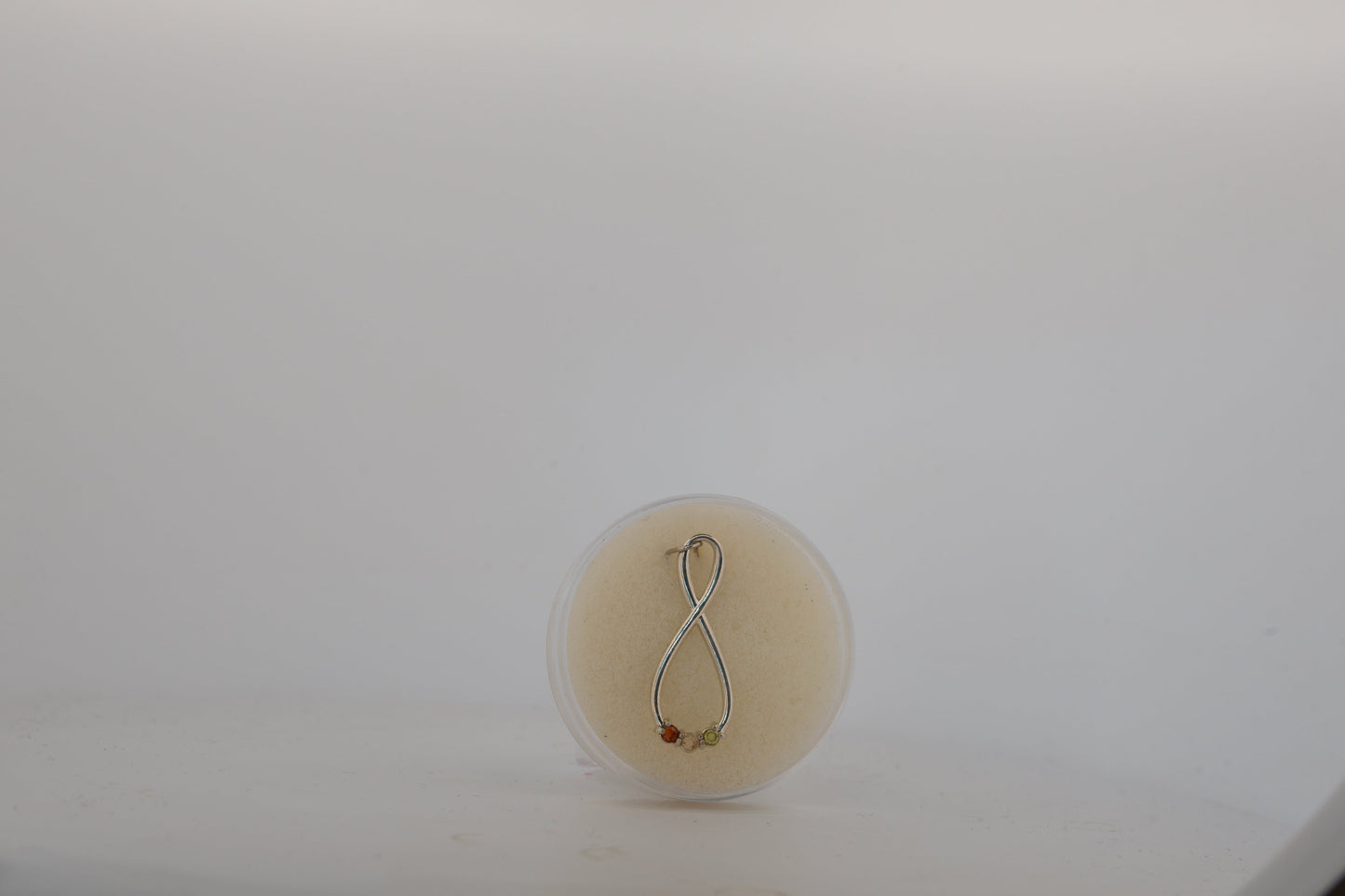 Stuller multi-stone infinity pendant