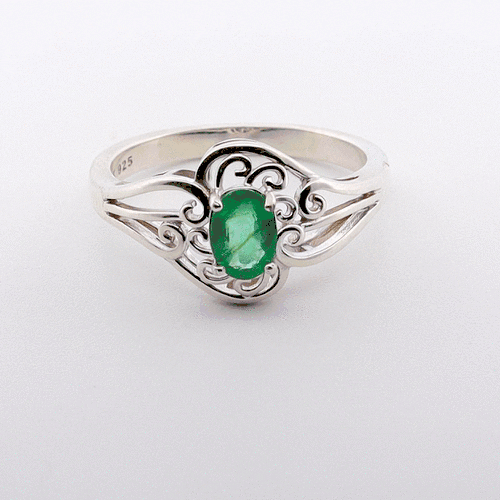 Emerald gemstone spinning display