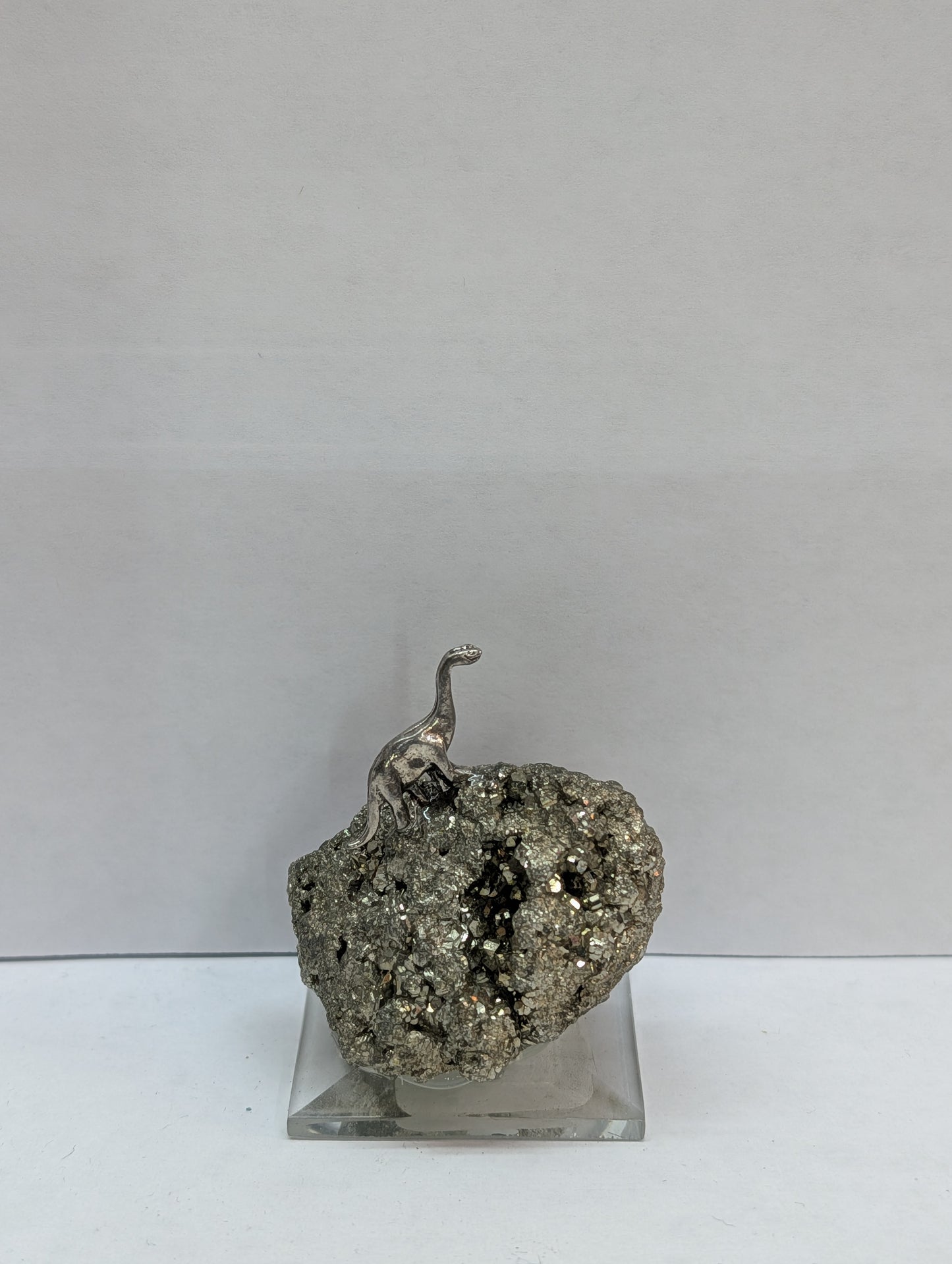 Brontosaurs on pyrite base