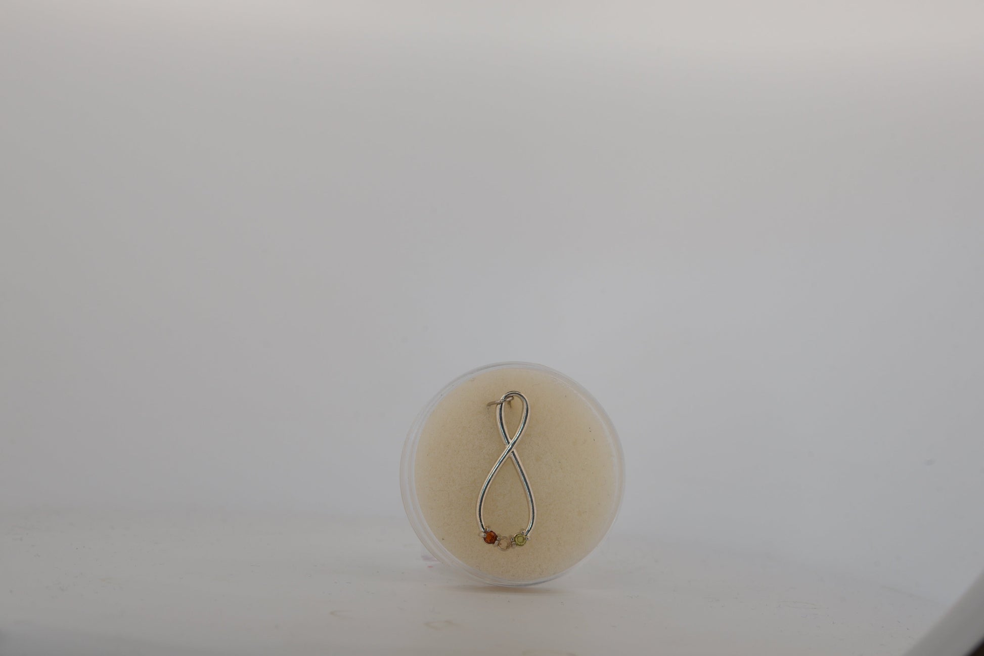 Stuller multi-stone infinity pendant